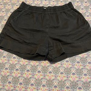 Everlane easy shirt size 4.  Definitely worn in but lots of life left.